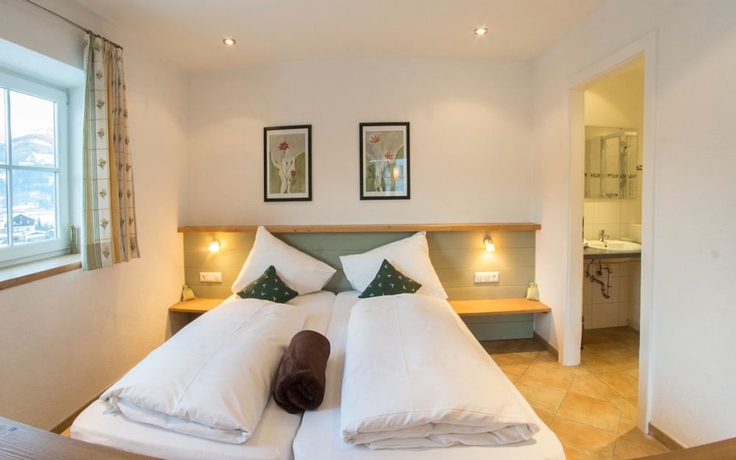 Imagen de la habitación del Hotel Dorfchalets Kaprun. Foto 8