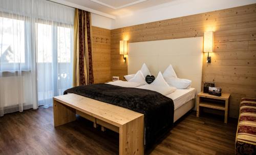 Imagen de la habitación del Hotel Dorfer Alpine&Charming. Foto 9