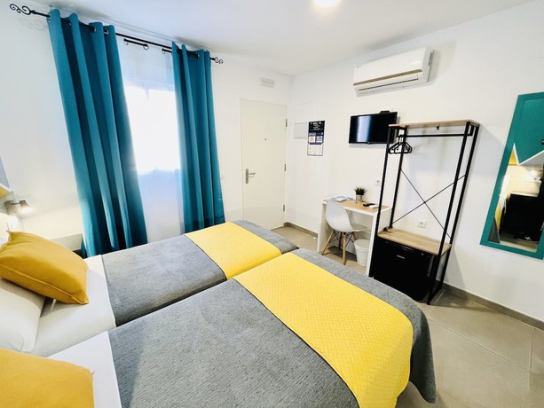 Imagen de la habitación del Hotel Dori Rooms Hostal. Foto 9