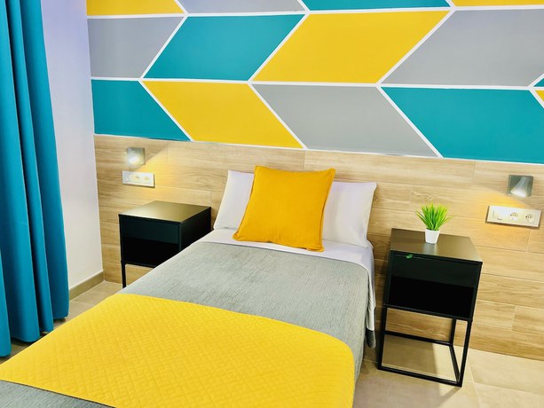 Imagen de la habitación del Hotel Dori Rooms Hostal. Foto 17
