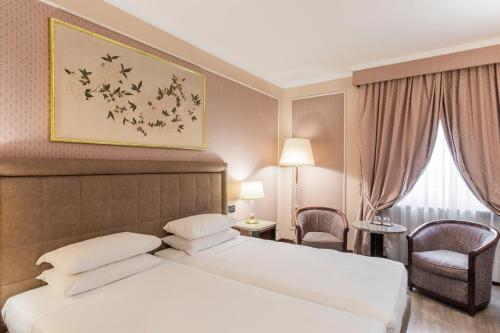 Imagen de la habitación del Hotel Doria Grand. Foto 9