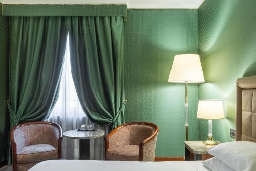 Imagen de la habitación del Hotel Doria Grand. Foto 12