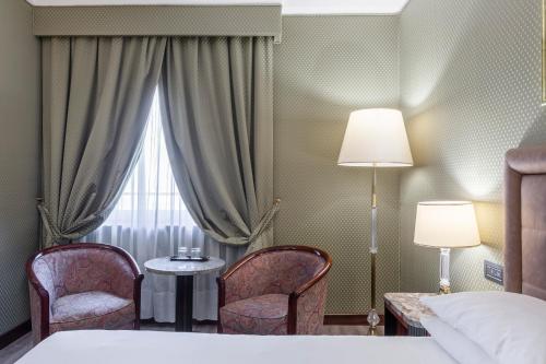 Imagen de la habitación del Hotel Doria Grand. Foto 16