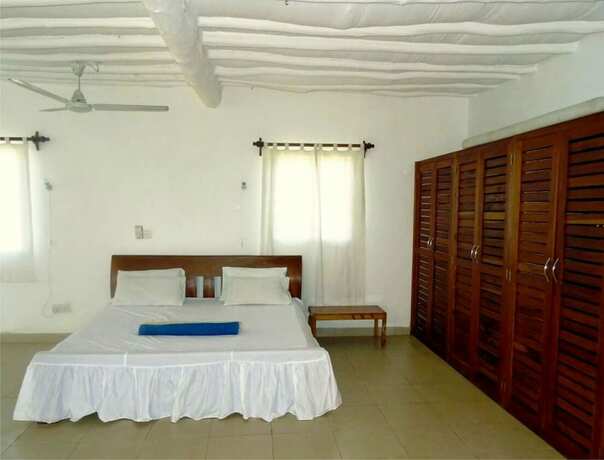 Imagen de la habitación del Hotel Doric Cottages Diani. Foto 17