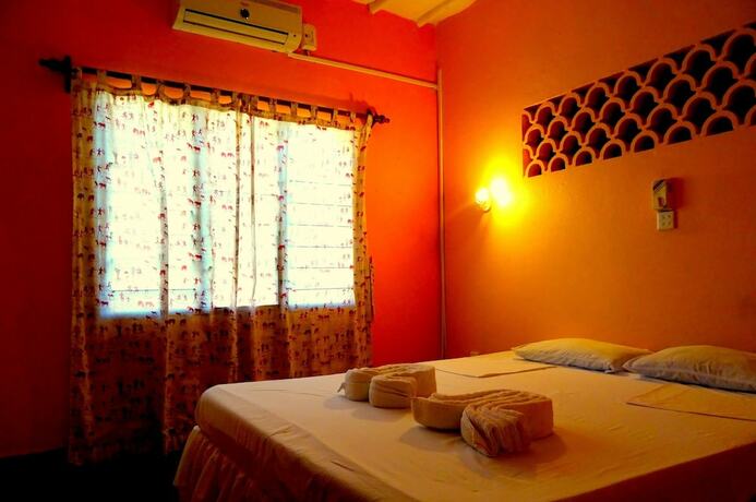 Imagen de la habitación del Hotel Doric Cottages Diani. Foto 20