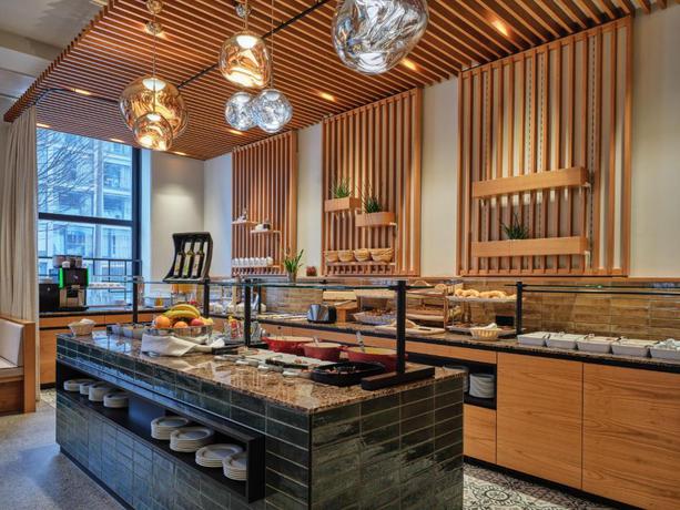 Imagen del bar/restaurante del Hotel Dorint City-hotel Salzburg. Foto 2