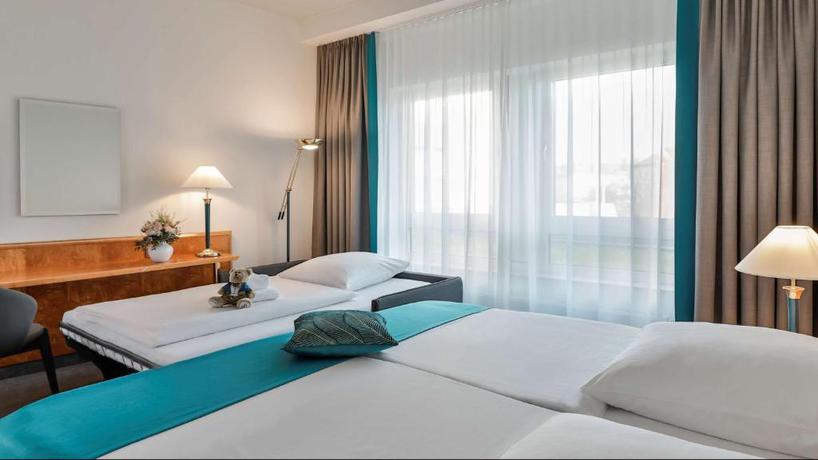 Imagen de la habitación del Hotel Dorint Dresden. Foto 7