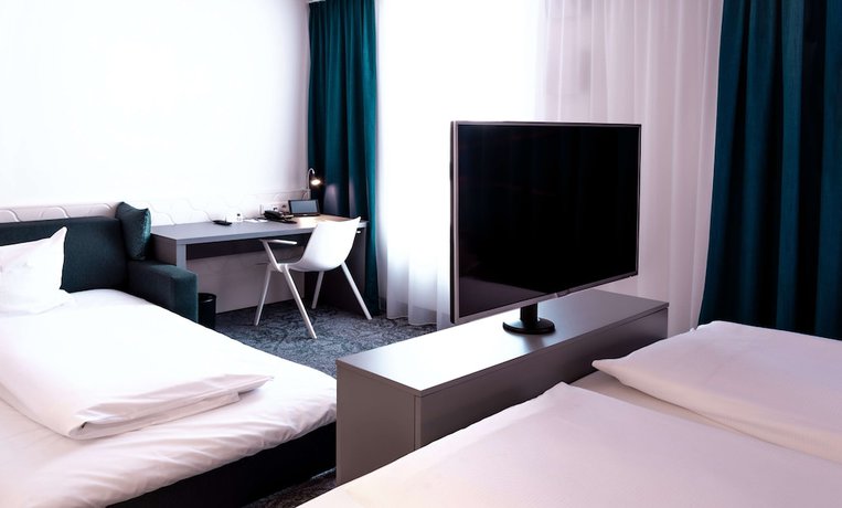 Imagen de la habitación del Hotel Dorint Düren. Foto 3