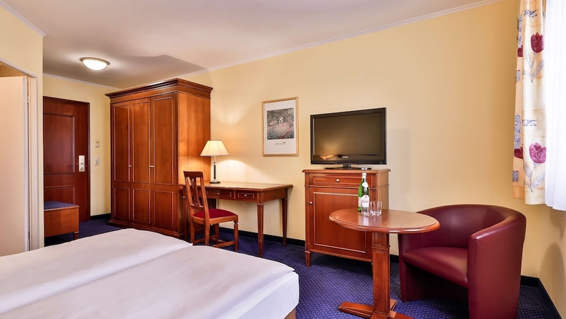 Imagen de la habitación del Hotel Dorint Marc Aurel Resort Bad Goegging. Foto 15