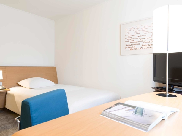 Imagen de la habitación del Hotel Dorint Würzburg. Foto 7