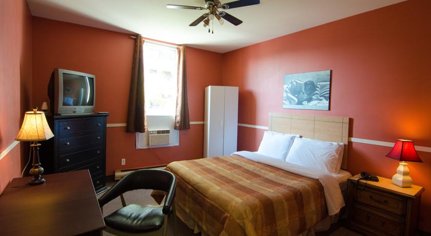 Imagen de la habitación del Hotel Dorion, Montreal. Foto 6