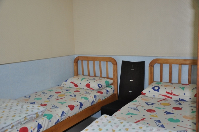 Imagen de la habitación del Hotel DormHK. Foto 6