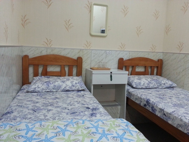 Imagen de la habitación del Hotel DormHK. Foto 13