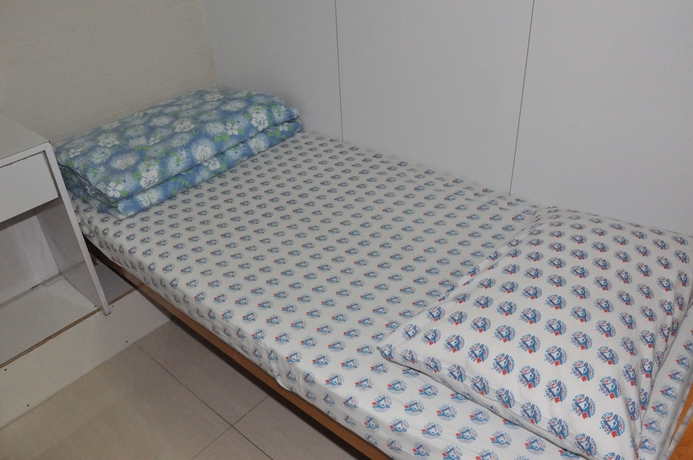 Imagen de la habitación del Hotel DormHK. Foto 14