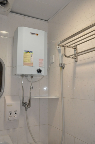 Imagen de la habitación del Hotel DormHK. Foto 16