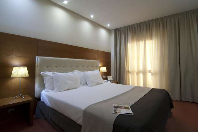 Imagen de la habitación del Hotel Dorma Coliseum. Foto 8