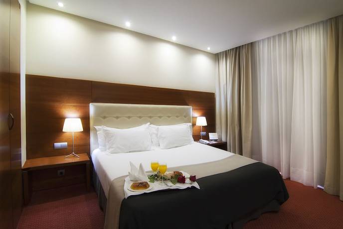 Imagen de la habitación del Hotel Dorma Coliseum. Foto 11