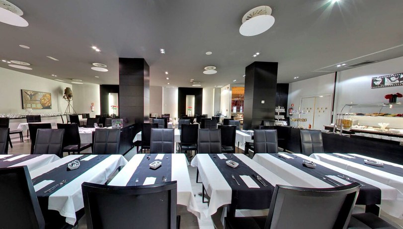 Imagen de la habitación del Hotel Dorma Coliseum. Foto 15