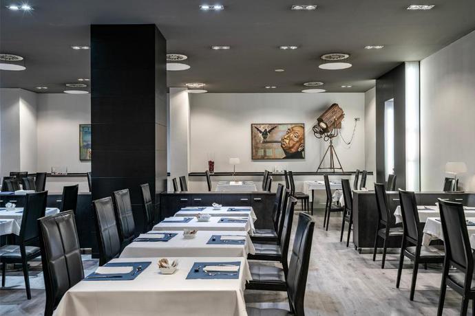 Imagen del bar/restaurante del Hotel Dorma Coliseum. Foto 5