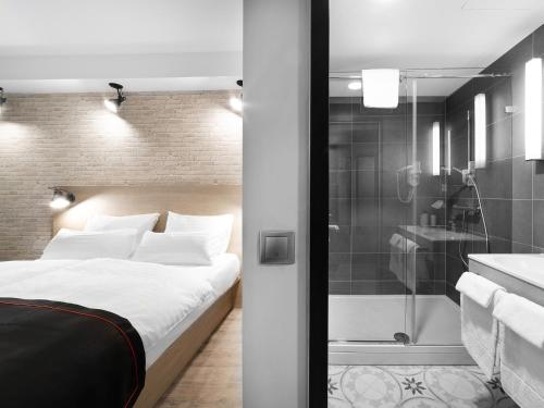 Imagen de la habitación del Hotel Dormero Budapest. Foto 6