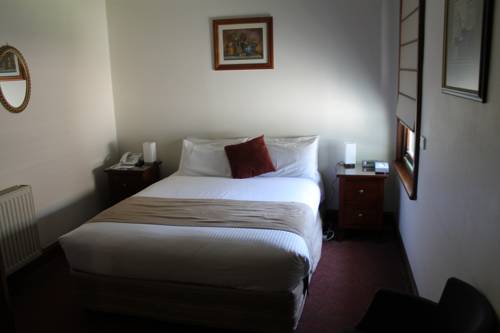 Imagen de la habitación del Hotel Dormie House. Foto 4