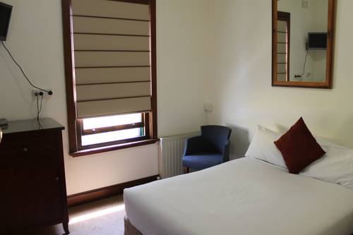 Imagen de la habitación del Hotel Dormie House. Foto 5