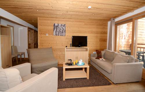 Imagen de la habitación del Hotel Dormio Resort Les Portes Du Grand Massif. Foto 2