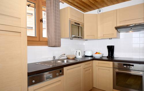 Imagen de la habitación del Hotel Dormio Resort Les Portes Du Grand Massif. Foto 10