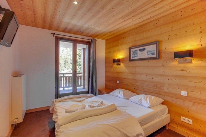 Imagen de la habitación del Hotel Dormio Resort Les Portes Du Mont Blanc. Foto 8