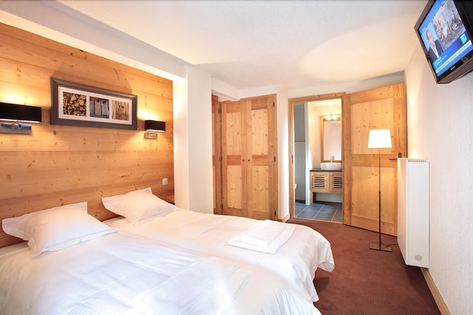 Imagen de la habitación del Hotel Dormio Resort Les Portes Du Mont Blanc. Foto 11