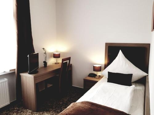 Imagen de la habitación del Hotel Dormir. Foto 8
