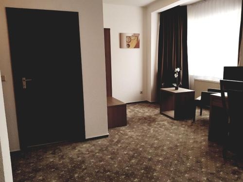 Imagen de la habitación del Hotel Dormir. Foto 10