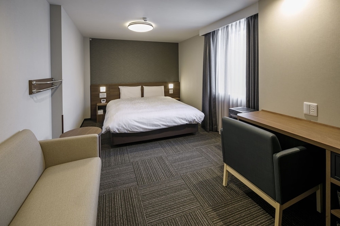 Imagen de la habitación del Hotel Dormy Inn EXPRESS Toyohashi Hot Spring. Foto 11