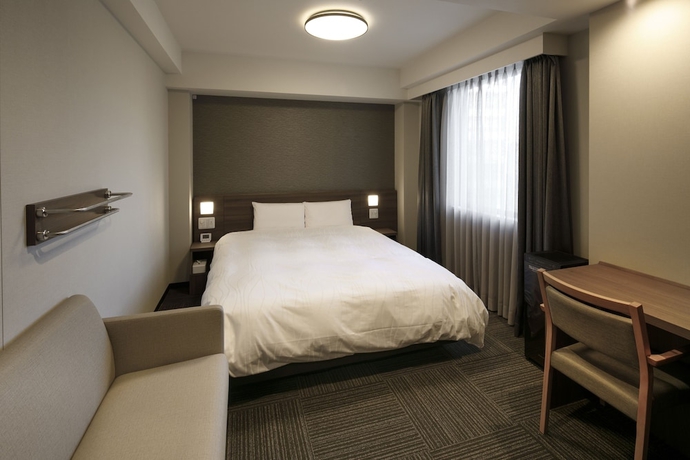 Imagen de la habitación del Hotel Dormy Inn EXPRESS Toyohashi Hot Spring. Foto 15