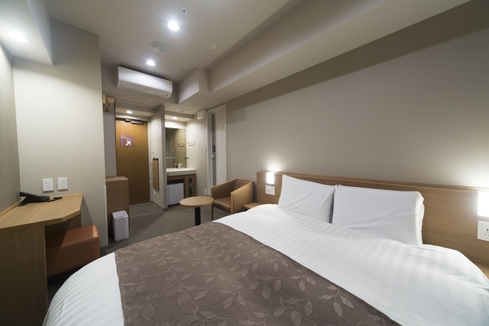 Imagen de la habitación del Hotel Dormy Inn Hatchobori Tokyo. Foto 2