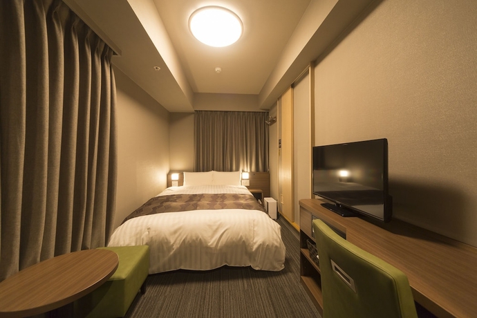 Imagen de la habitación del Hotel Dormy Inn Hatchobori Tokyo. Foto 3