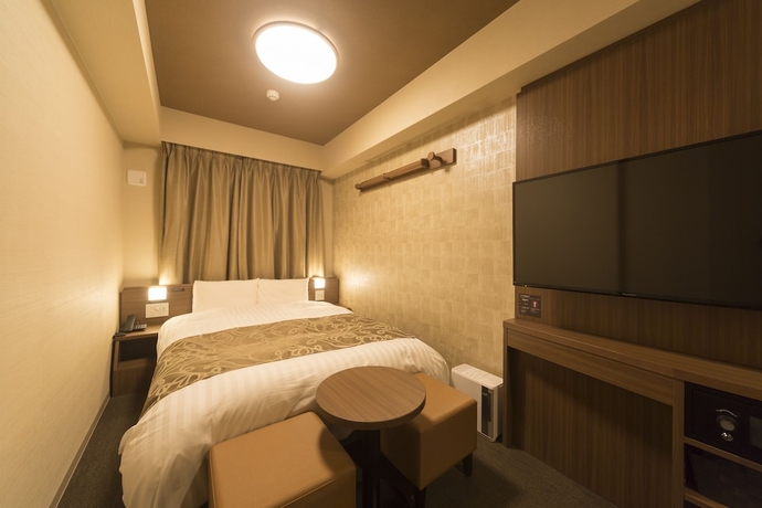 Imagen de la habitación del Hotel Dormy Inn Hatchobori Tokyo. Foto 4
