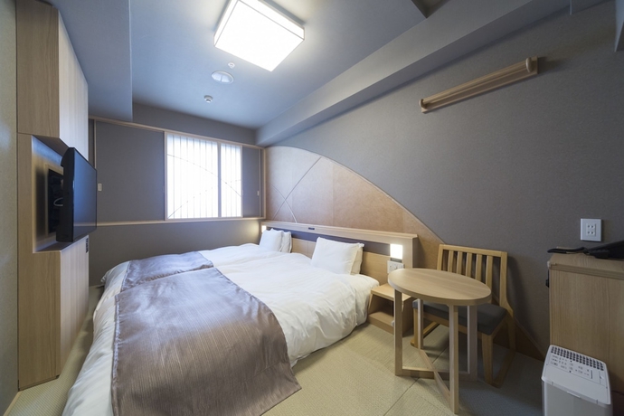 Imagen de la habitación del Hotel Dormy Inn Hatchobori Tokyo. Foto 10