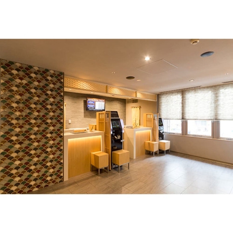 Imagen de los interiores del Hotel Dormy Inn Hatchobori Tokyo. Foto 19