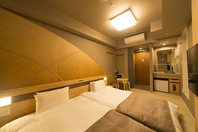 Imagen de la habitación del Hotel Dormy Inn Hatchobori Tokyo. Foto 14