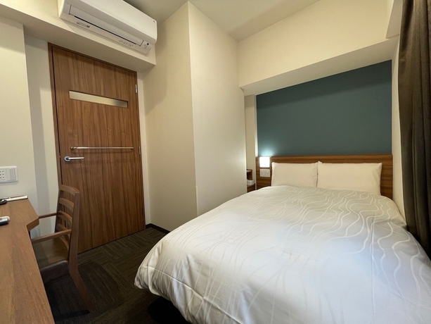 Imagen de la habitación del Hotel Dormy Inn Ikebukuro Hot Springs. Foto 13