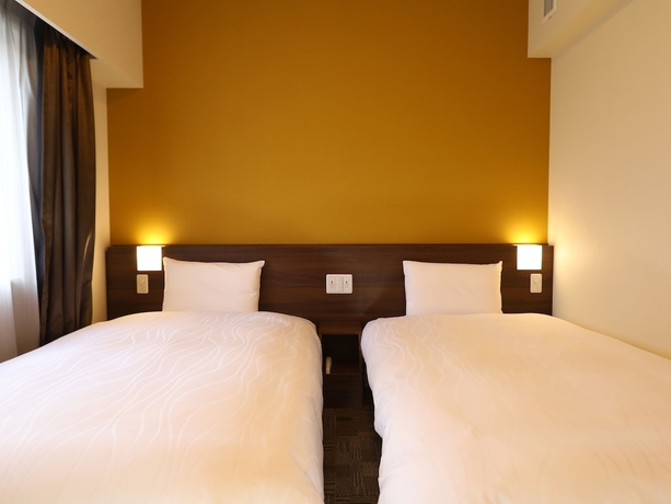 Imagen de la habitación del Hotel Dormy Inn Ikebukuro Hot Springs. Foto 17