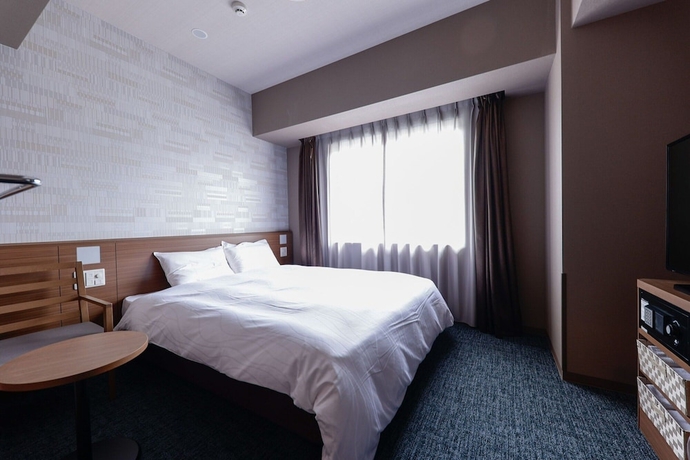 Imagen de la habitación del Hotel Dormy Inn Kobe Motomachi Natural Hot Springs. Foto 11