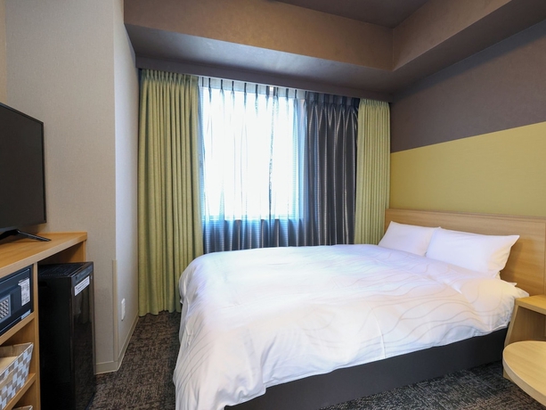Imagen de la habitación del Hotel Dormy Inn Komatsu Heihou-no-Yu. Foto 2