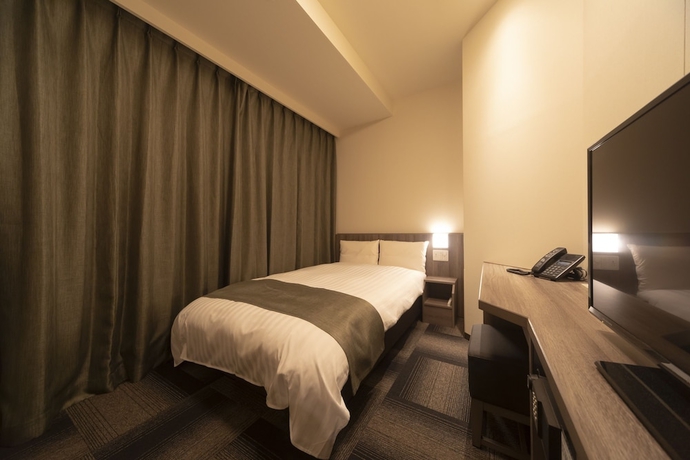 Imagen de la habitación del Hotel Dormy Inn Korakuen Hot Springs. Foto 4