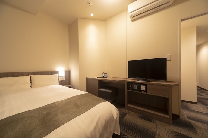 Imagen de la habitación del Hotel Dormy Inn Korakuen Hot Springs. Foto 5