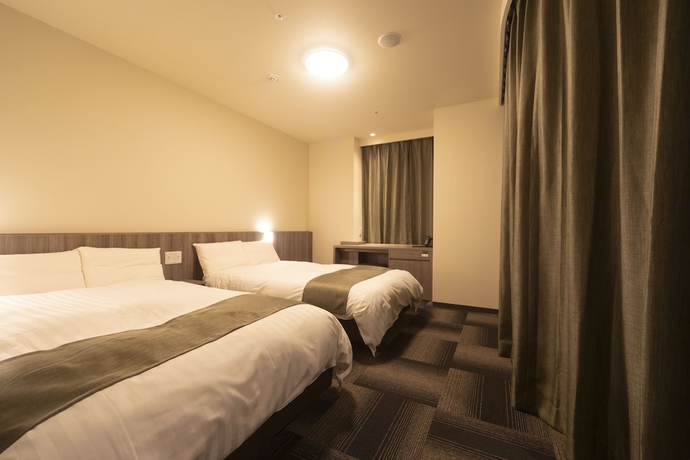 Imagen de la habitación del Hotel Dormy Inn Korakuen Hot Springs. Foto 11