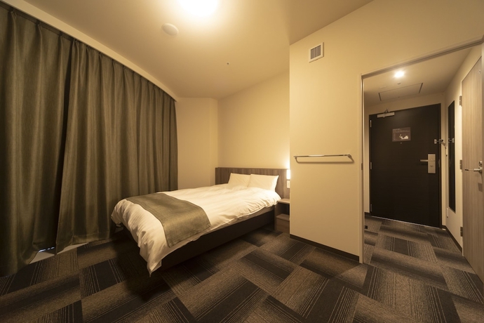 Imagen de la habitación del Hotel Dormy Inn Korakuen Hot Springs. Foto 15