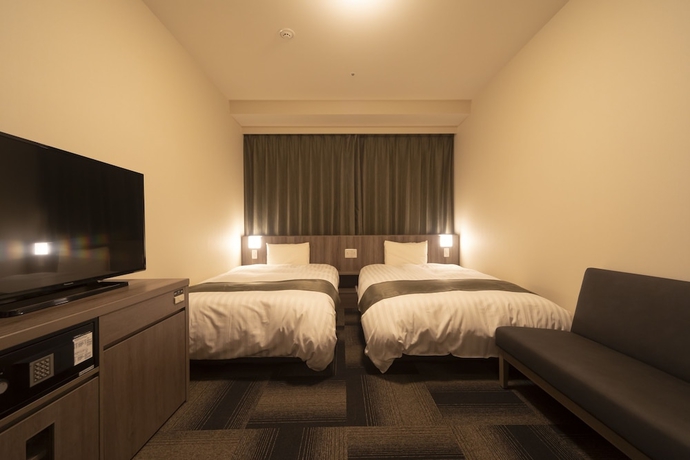 Imagen de la habitación del Hotel Dormy Inn Korakuen Hot Springs. Foto 17