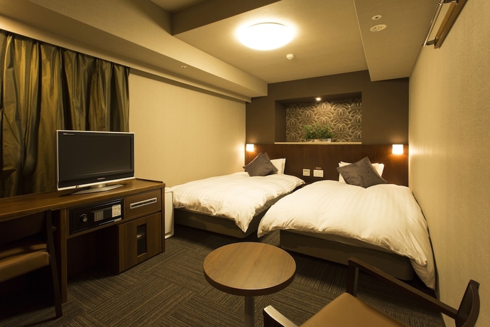 Imagen de la habitación del Hotel Dormy Inn Kumamoto Natural Hot Spring. Foto 4